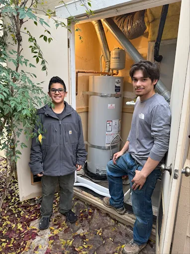 Alberto's two kids with a completed Premier Plumbing Solutions 925 water heater replacement in Brentwood CA