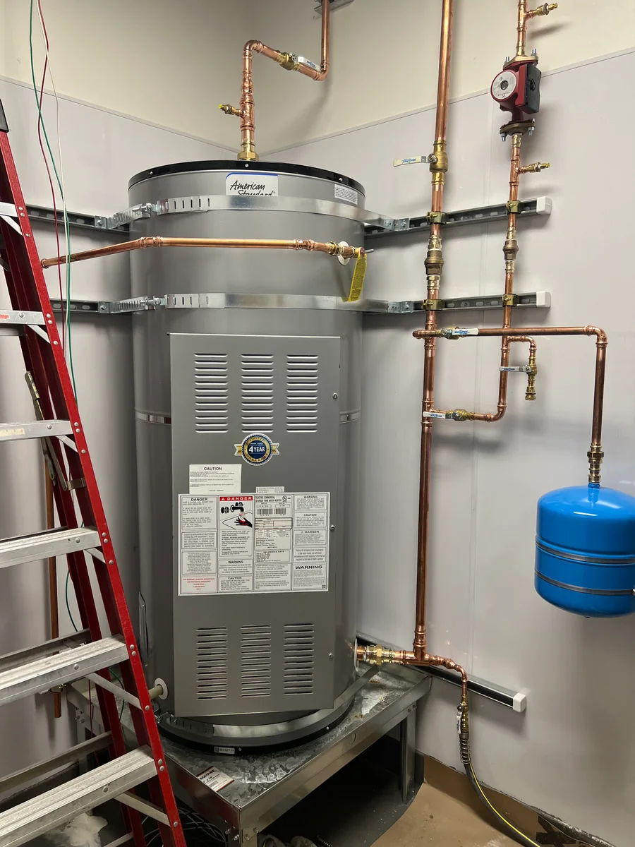 Gas water heater installation with copper piping by Premier Plumbing Solutions 925