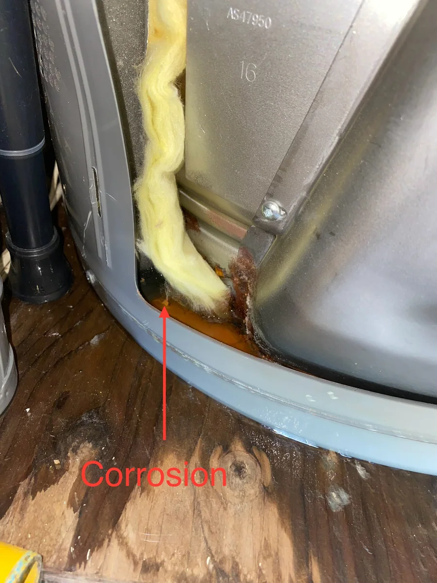 Leaking water heater base inspection by Premier Plumbing Solutions 925