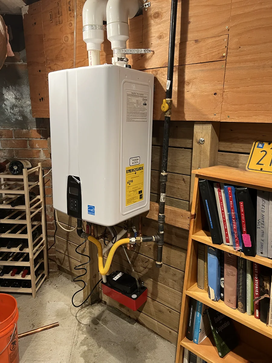 Interior tankless water heater installation by Premier Plumbing Solutions 925