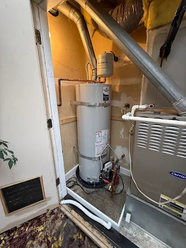 Water heater utility closet installation by Premier Plumbing Solutions 925
